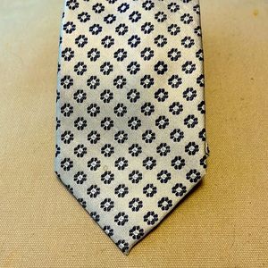 Silver Bocara tie with navy flower patterns